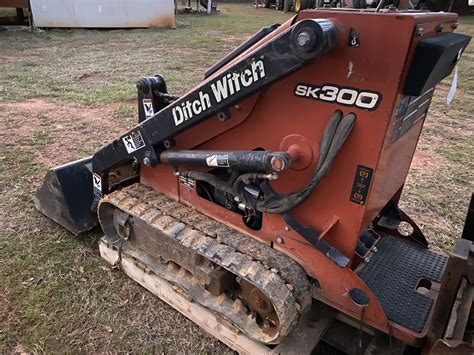 ditch witch mini track loader|ride behind skid steer loader.